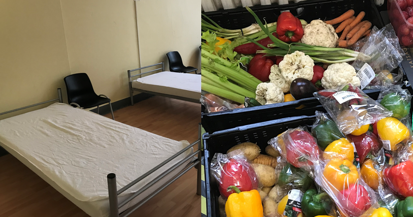 Ein Bett in der Notübernachtung und ein Korb mit Obst und Gemüse